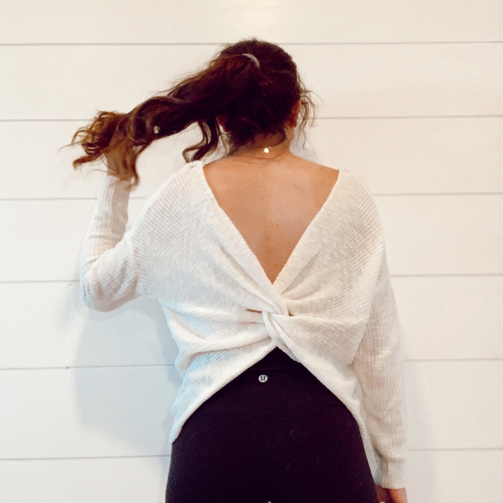 white sweater with twisted back